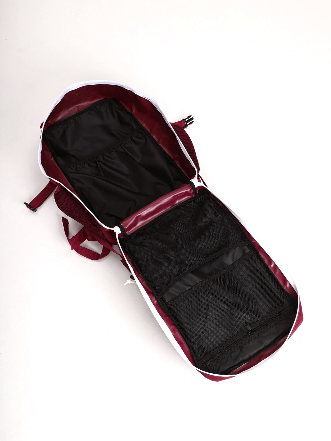 HolStrength 45L Tactical Backpack opened to show spacious black lined compartments and multiple zippered pockets in a slim burgundy design