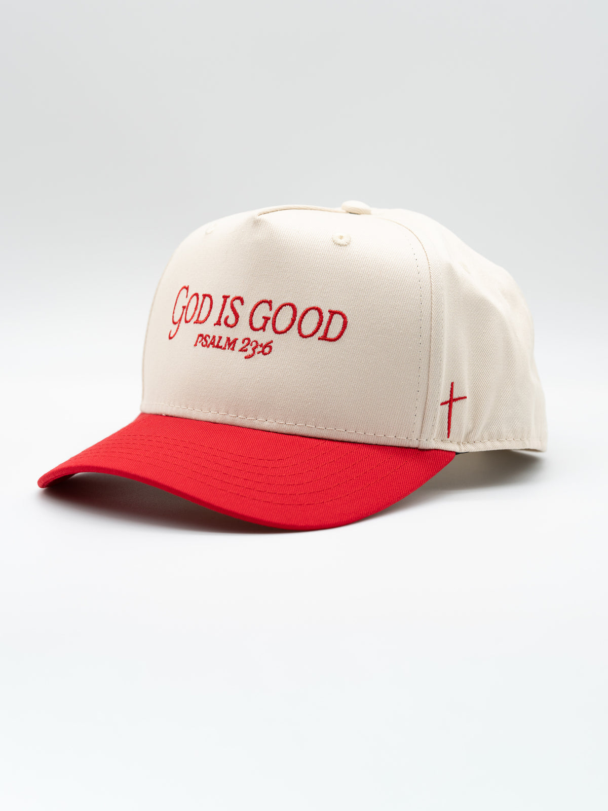 Premium Embroidered Hat in cream and red with God Is Good and Psalm 23 6 embroidery plus a cross detail for Christian faith based apparel