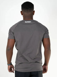 Man wearing a Iron t-shirt with a white logo, back view